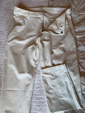 NWT Nike 24.7 Dri-Fit Men's pants Off-White Chino/GOLF Pants. 36x32.